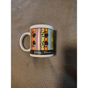 Ceramic souvenir mug with a vibrant design celebrating Great Smoky Mountains.